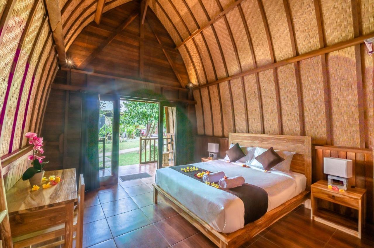 Wooden Puri Guesthouse by Bukit Vista Uluwatu  Bagian luar foto