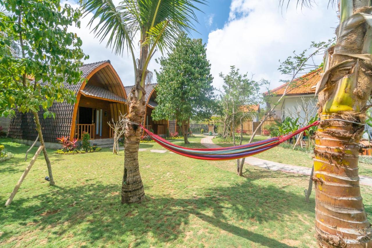 Wooden Puri Guesthouse by Bukit Vista Uluwatu  Bagian luar foto